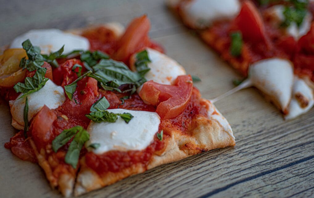 close-up of a margherita flatbread
